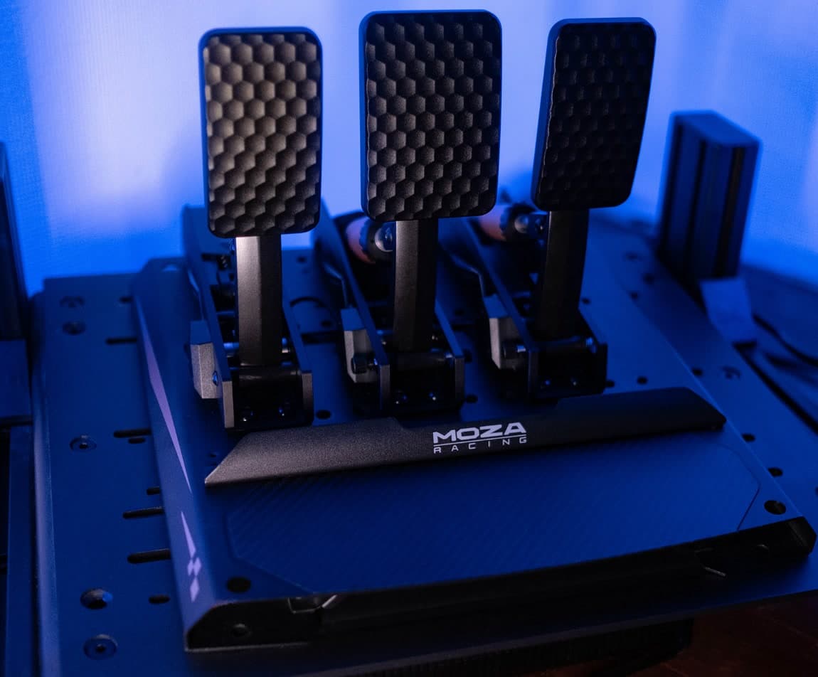 A close-up of a three-pedal load-cell pedal set