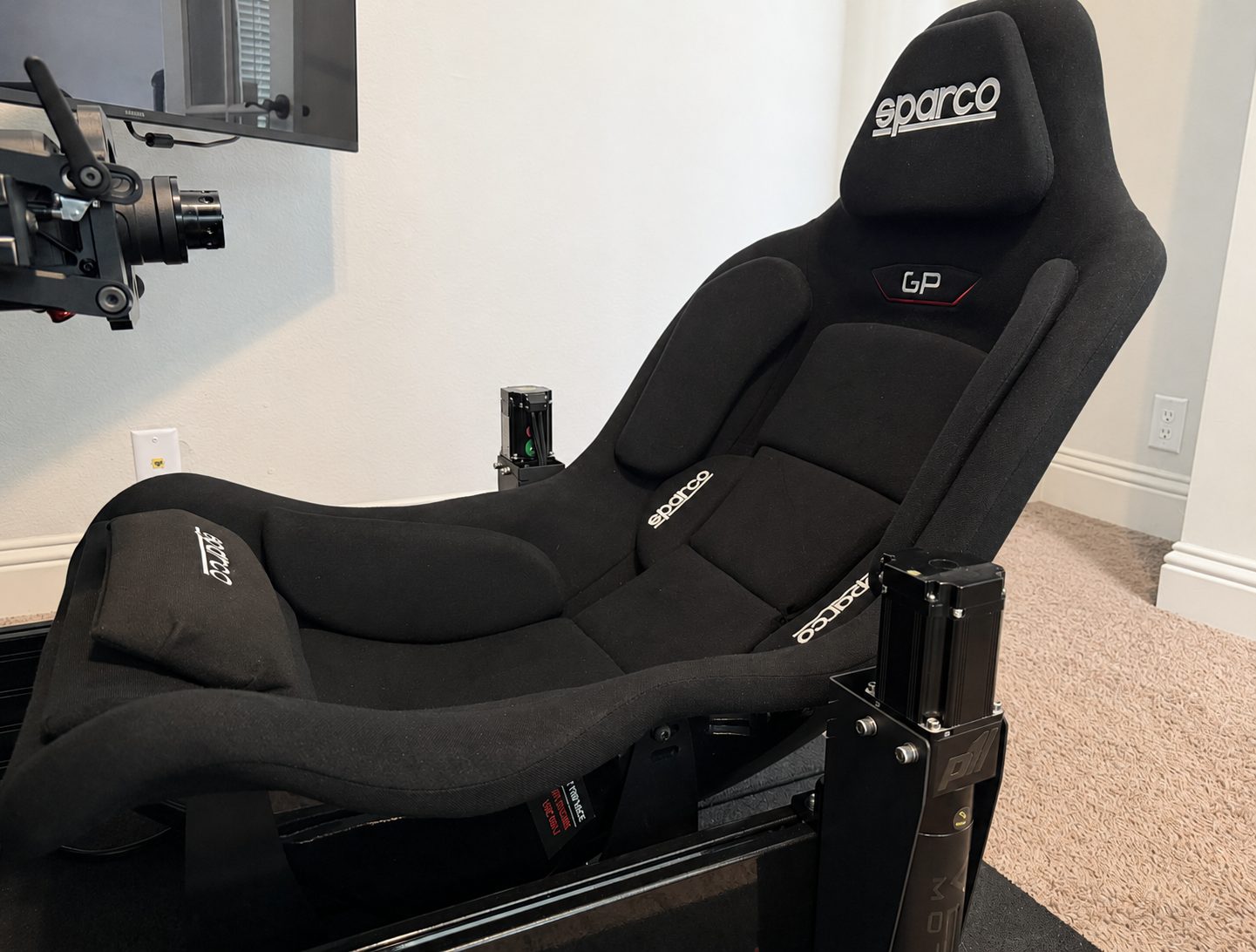 Sparco GP racing seat mounted on the simulator frame
