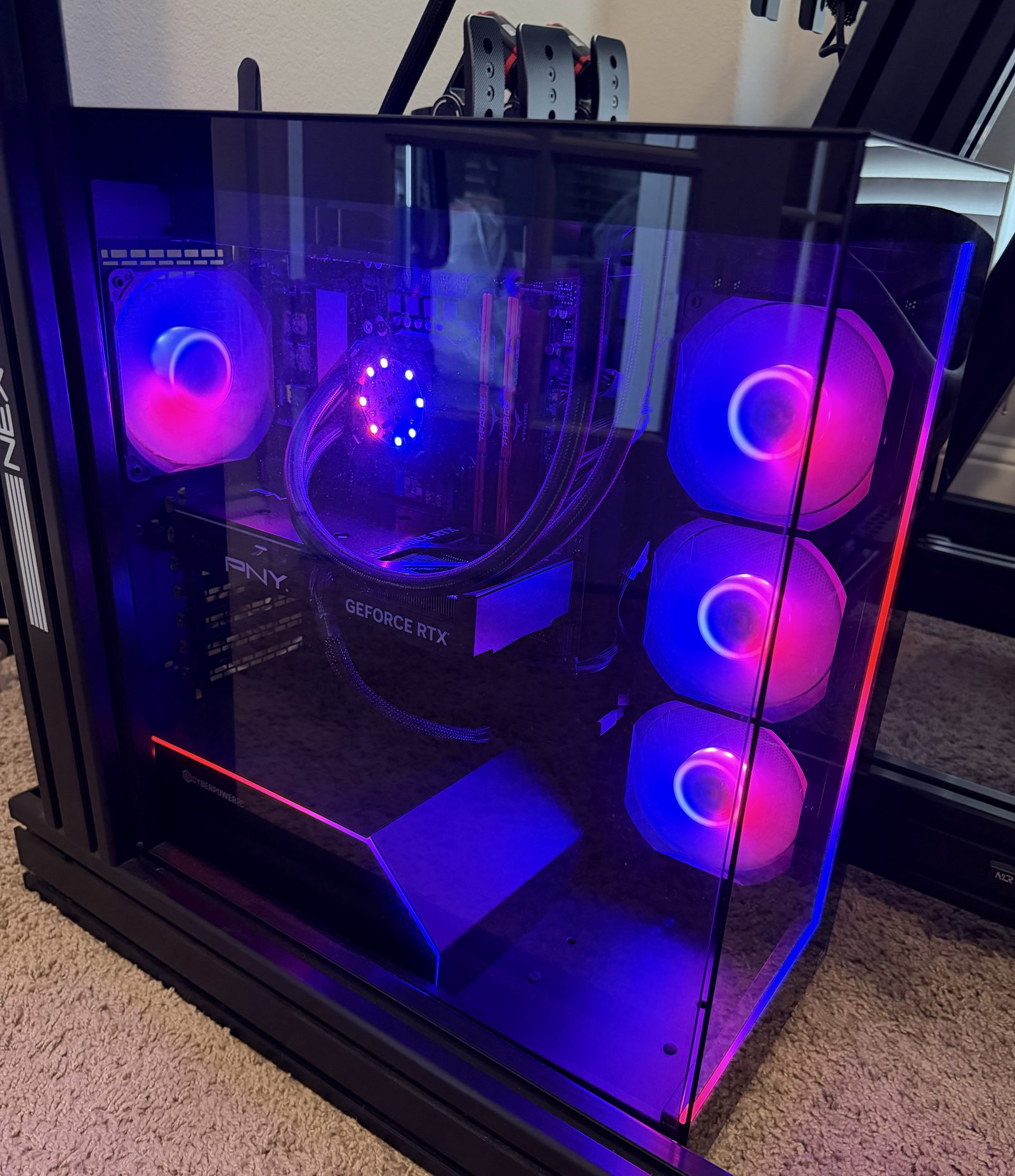Gaming PC with RGB lighting next to the rig